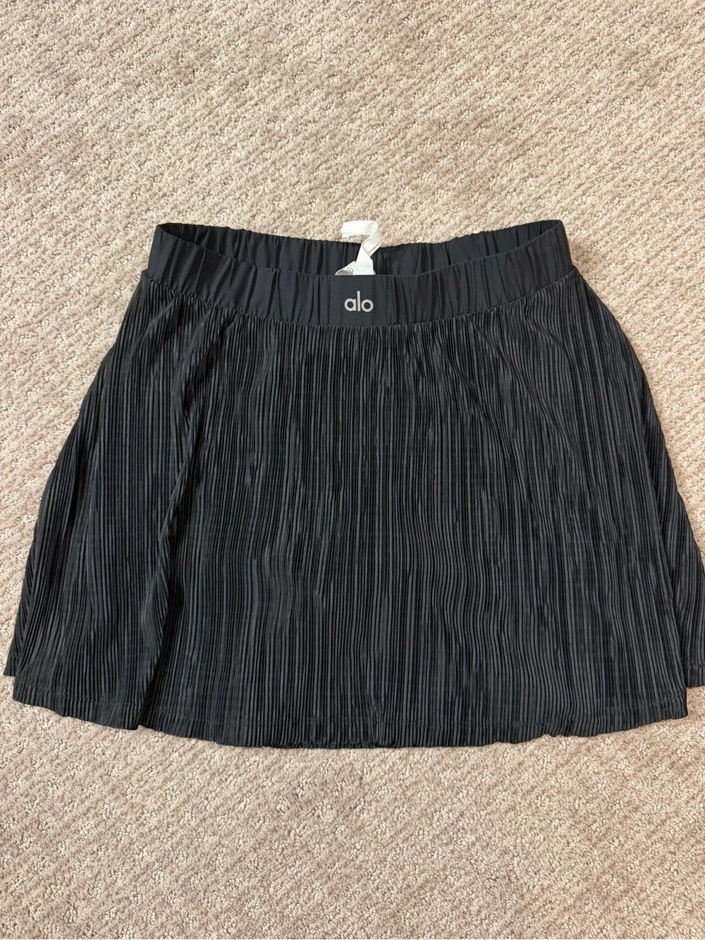 Woman’s black Alo Micro Plisse Tennis Skirt size small